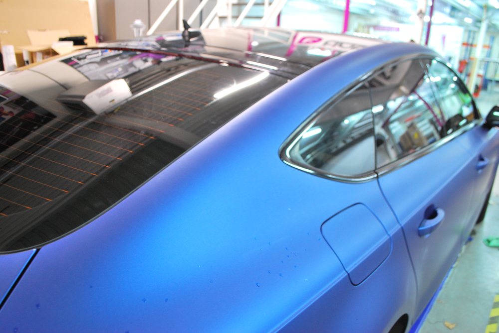 Satin blue car panel and roofline after paint correction in the Broadmeadow studio